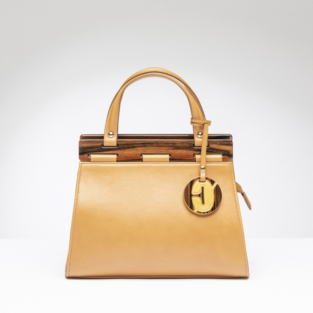 Borsa artigianale Oswaldo Filipponi in legno e pelle per alta moda e lusso
